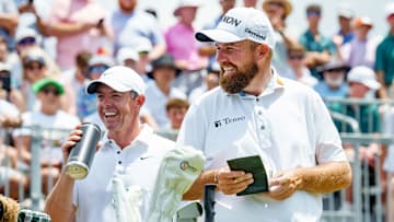 Rory McIlroy laughs with Shane Lowry before their final round of the Zurich Classic of New Orleans golf tournament