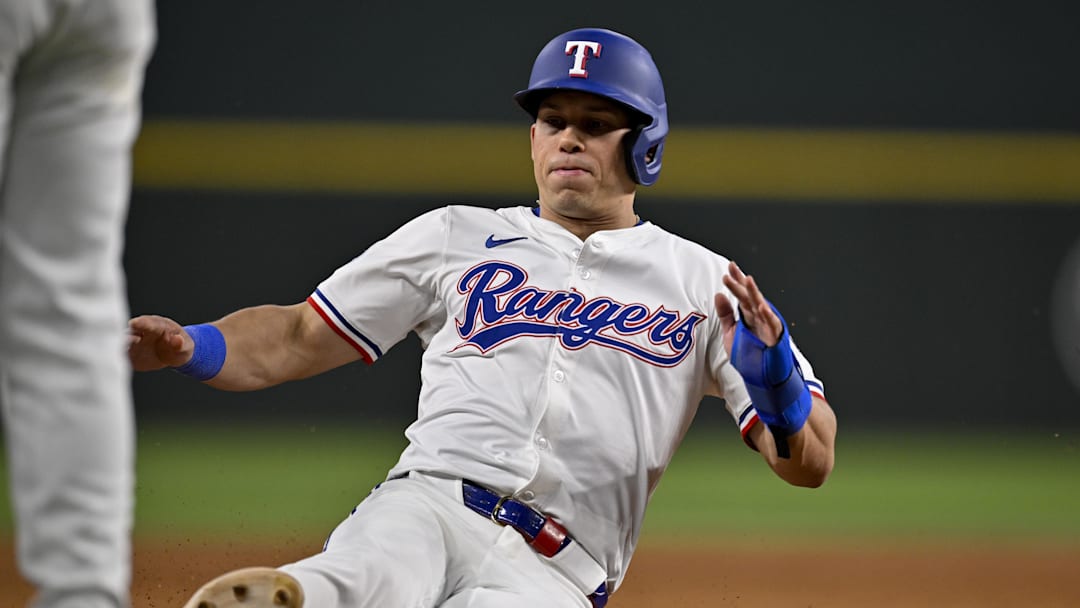 Aug 11, 2025; Arlington, Texas, USA; Texas Rangers center fielder Sam Haggerty (0) in action during the game between the Texas Rangers and the Arizona Diamondbacks at Globe Life Field. Mandatory Credit: Jerome Miron-Imagn Images