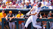 Texas A&M Aggies right fielder Jace Laviolette (17) hits a home run against the Tennessee Volunteers during the first inning at Charles Schwab Field Omaha.