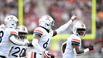 Sep 30, 2023; Chestnut Hill, Massachusetts, USA; Virginia Cavaliers cornerback Dre Walker (6) reacts after making an interception against the Boston College Eagles during the first half at Alumni Stadium. Mandatory Credit: Brian Fluharty-Imagn Images
