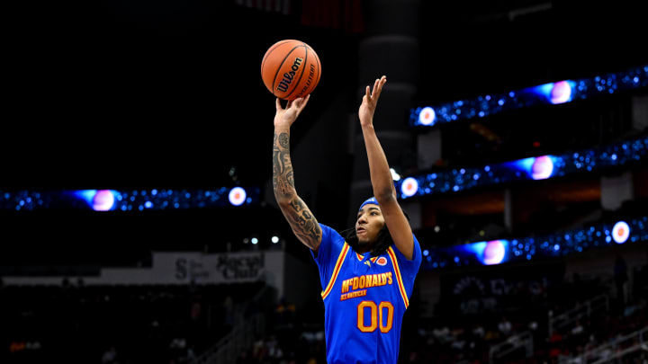 Apr 2, 2024; Houston, TX, USA; McDonald's All American East guard Johnuel Fland (00) shoots a three point basket during the first half against the McDonald's All American West at Toyota Center. Mandatory Credit: Maria Lysaker-USA TODAY Sports