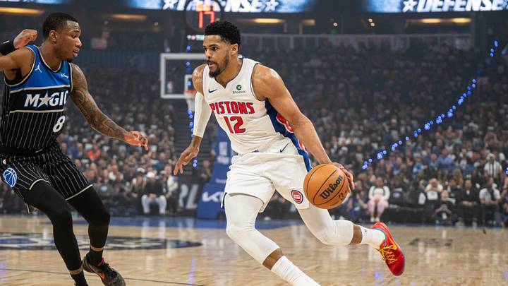 May 1, 2026; Orlando, Florida, USA; Detroit Pistons forward Tobias Harris (12) dribbles the ball against Orlando Magic forward Jamal Cain (8) in the first quarter during game six of the first round of the 2026 NBA Playoffs at Kia Center. Mandatory Credit: Jeremy Reper-Imagn Images