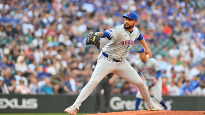 Aug 10, 2024; Seattle, Washington, USA; New York Mets starting pitcher Sean Manaea (59) pitches to the Seattle Mariners during the first inning at T-Mobile Park. Mandatory Credit: Steven Bisig-USA TODAY Sports