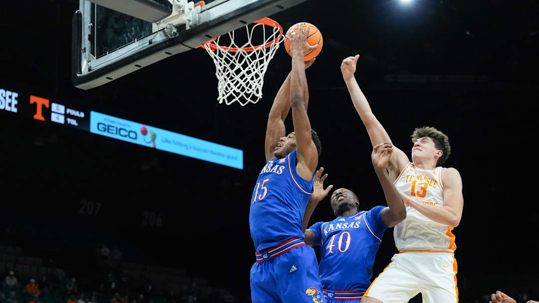 Nov 26, 2025; Las Vegas, NV, USA; Kansas Jayhawks forward Bryson Tiller (15) reacts for a rebound in the first half against the Tennessee Volunteers in the 2025 Players Era Festival third place game at MGM Grand Garden Arena. Mandatory Credit: Kirby Lee-Imagn Images