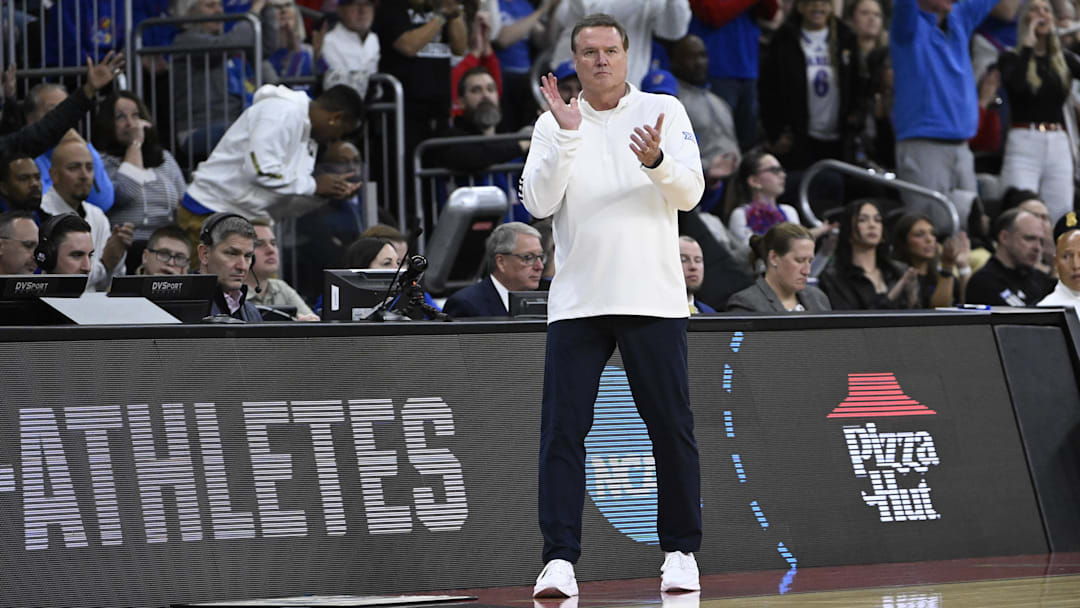 Mar 20, 2025; Providence, RI, USA;  Kansas Jayhawks head coach Bill Self reacts during the first half against the Arkansas Razorbacks at Amica Mutual Pavilion. 
