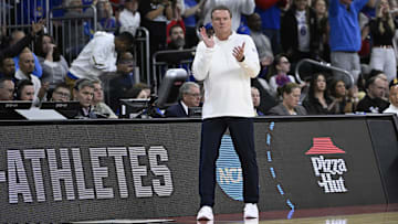 Mar 20, 2025; Providence, RI, USA;  Kansas Jayhawks head coach Bill Self reacts during the first half against the Arkansas Razorbacks at Amica Mutual Pavilion. 