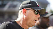 Oct 11, 2025; Cincinnati, Ohio, USA; Cincinnati Bearcats head coach Scott Satterfield walks off the field after his team’s game against the UCF Knights at Nippert Stadium. Mandatory Credit: Aaron Doster-Imagn Images