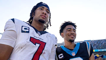 Oct 29, 2023; Charlotte, North Carolina, USA; Houston Texans quarterback C.J. Stroud (7) and Carolina Panthers quarterback Bryce Young (9) after the game at Bank of America Stadium. Mandatory Credit: Bob Donnan-Imagn Images