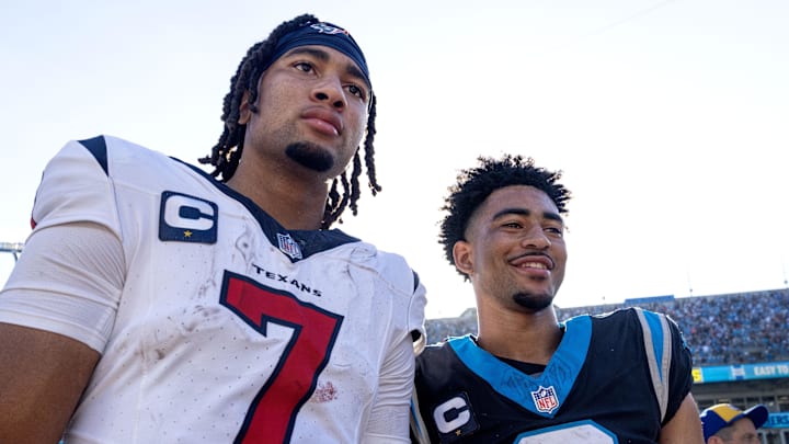 Oct 29, 2023; Charlotte, North Carolina, USA; Houston Texans quarterback C.J. Stroud (7) and Carolina Panthers quarterback Bryce Young (9) after the game at Bank of America Stadium. Mandatory Credit: Bob Donnan-Imagn Images