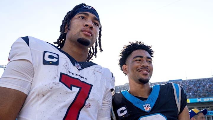 Oct 29, 2023; Charlotte, North Carolina, USA; Houston Texans quarterback C.J. Stroud (7) and Carolina Panthers quarterback Bryce Young (9) after the game at Bank of America Stadium. 