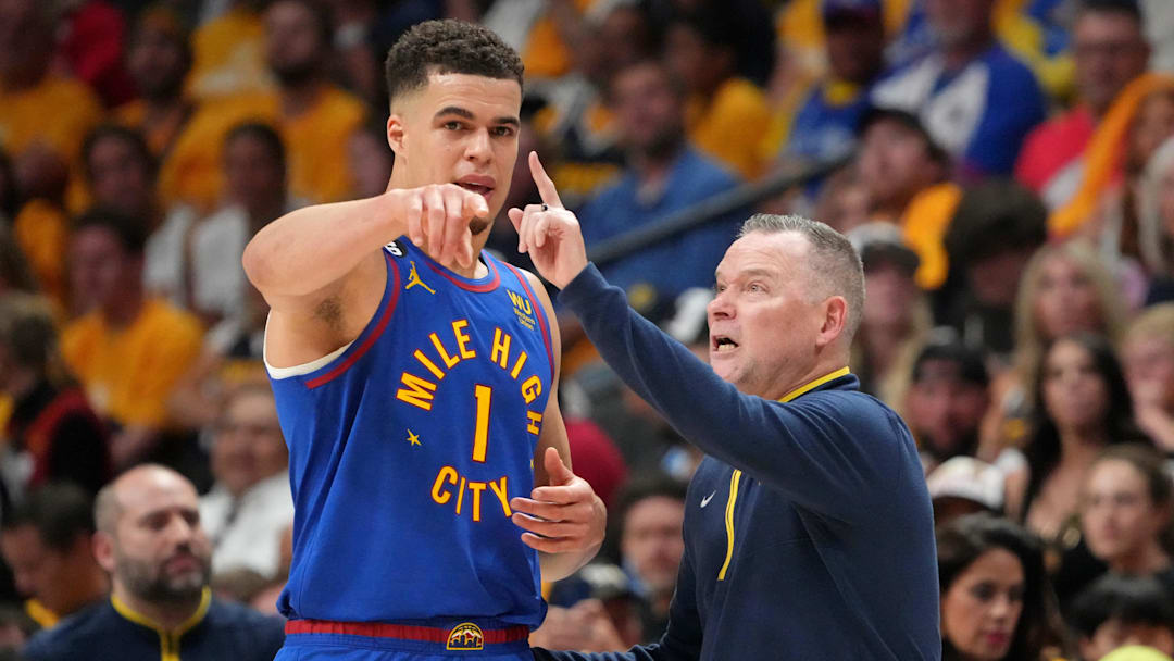 Jun 1, 2023; Denver, CO, USA; Denver Nuggets forward Michael Porter Jr. (1) talks with head coach Michael Malone against the Miami Heat during the third quarter in game one of the 2023 NBA Finals at Ball Arena. Mandatory Credit: Kyle Terada-Imagn Images