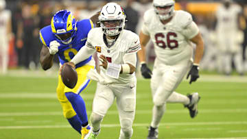 Dec 28, 2024; Inglewood, California, USA;  Arizona Cardinals quarterback Kyler Murray (1) scrambles for a first down in the second half against the Los Angeles Rams at SoFi Stadium. Mandatory Credit: Jayne Kamin-Oncea-Imagn Images