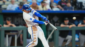 Jul 22, 2024; Kansas City, Missouri, USA; Kansas City Royals shortstop Bobby Witt Jr. (7) hits a double during the third inning against the Arizona Diamondbacks at Kauffman Stadium. Mandatory Credit: Jay Biggerstaff-USA TODAY Sports