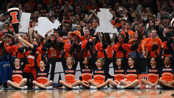 Mar 30, 2024; Boston, MA, USA; Illinois Fighting Illini cheerleaders react against the Connecticut Huskies in the finals of the East Regional of the 2024 NCAA Tournament at TD Garden. Mandatory Credit: Brian Fluharty-USA TODAY Sports