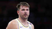 Mar 16, 2025; Los Angeles, California, USA; Los Angeles Lakers guard Luka Doncic (77) reacts against the Phoenix Suns in the second half at Crypto.com Arena. Mandatory Credit: Kirby Lee-Imagn Images