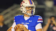Folsom senior quarterback Ryder Lyons, a four-star BYU commit, helped seal the game late and propel his Bulldogs to their fifth consecutive CIF San-Joaquin Section Division I championship with a dramatic 21-14 victory over Oak Ridge on Friday, Nov. 28, 2025.