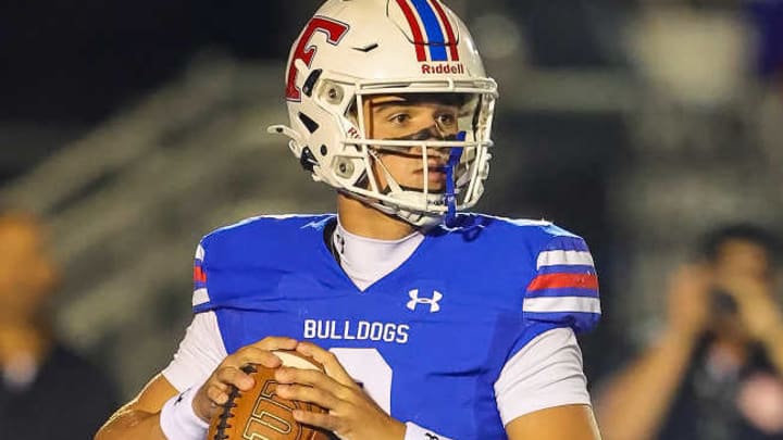 Folsom senior quarterback Ryder Lyons, a four-star BYU commit, helped seal the game late and propel his Bulldogs to their fifth consecutive CIF San-Joaquin Section Division I championship with a dramatic 21-14 victory over Oak Ridge on Friday, Nov. 28, 2025.