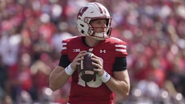 Sep 14, 2024; Madison, Wisconsin, USA;  Wisconsin Badgers quarterback Tyler Van Dyke (10) during the game against the Alabama Crimson Tide at Camp Randall Stadium. Mandatory Credit: Jeff Hanisch-Imagn Images