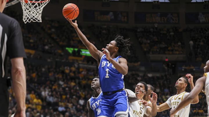 Feb 28, 2026; Morgantown, West Virginia, USA; BYU Cougars guard Robert Wright III (1) shoots in the lane during the first half against the West Virginia Mountaineers at Hope Coliseum. Mandatory Credit: Ben Queen-Imagn Images