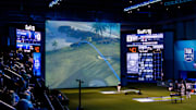 Golfer Matt Fitzpatrick watches his tee shot during the inaugural golf match at SoFi Center, the home of TGL, the interactive golf league founded by Tiger Woods and Rory McIlroy on January 7, 2025 in Palm Beach Gardens, Florida.