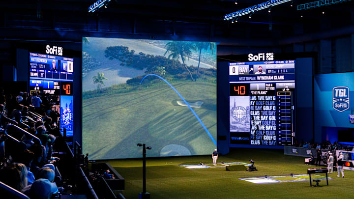 Golfer Matt Fitzpatrick watches his tee shot during the inaugural golf match at SoFi Center, the home of TGL, the interactive golf league founded by Tiger Woods and Rory McIlroy on January 7, 2025 in Palm Beach Gardens, Florida. Golfer Matt Fitzpatrick watches his tee shot during the inaugural golf match at SoFi Center, the home of TGL, the interactive golf league founded by Tiger Woods and Rory McIlroy on January 7, 2025 in Palm Beach Gardens, Florida.