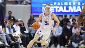 Mar 1, 2025; Provo, Utah, USA; Brigham Young Cougars forward Richie Saunders brings the ball up the court during the first half against the West Virginia Mountaineers at Marriott Center. Mandatory Credit: Rob Gray-Imagn Images