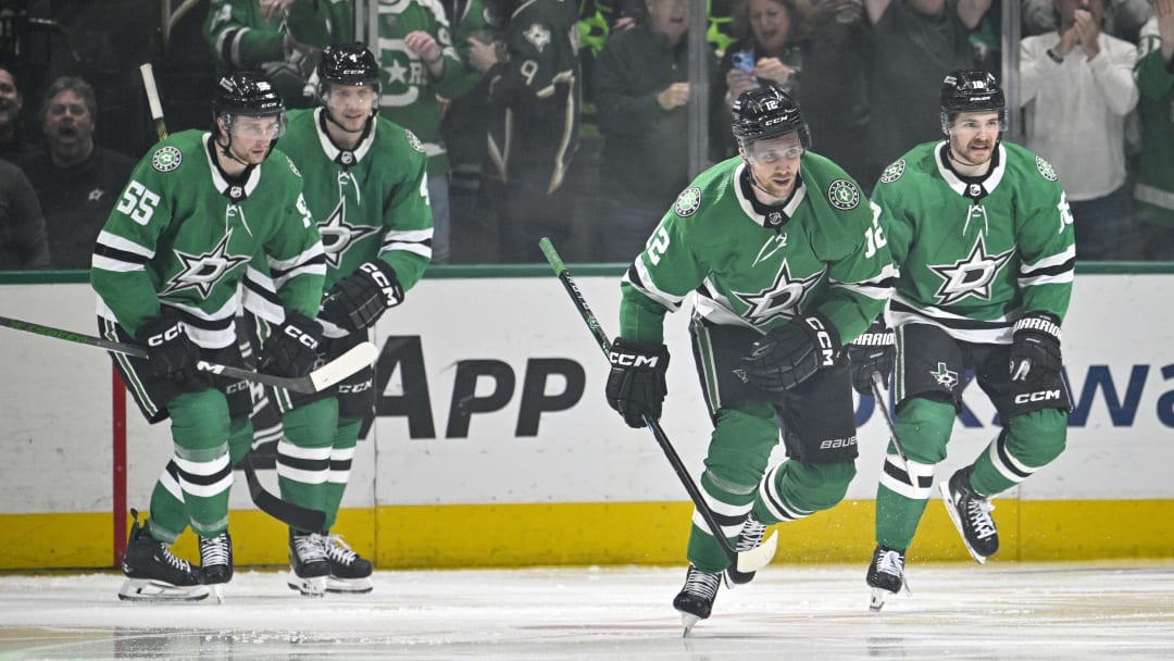 May 5, 2024; Dallas, Texas, USA; Dallas Stars center Radek Faksa (12) and defenseman Miro Heiskanen (4) and defenseman Thomas Harley (55) center Sam Steel (18) skate off the ice after Faksa scores the game winning goal against the Vegas Golden Knights during the third period in game seven of the first round of the 2024 Stanley Cup Playoffs at American Airlines Center. Mandatory Credit: Jerome Miron-USA TODAY Sports