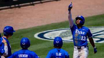 May 26, 2024; Charlotte, NC, USA; Duke Blue Devils outfielder Devin Obee (13) celebrates a grand slam in the sixth inning against the Florida State Seminoles during the ACC Baseball Tournament at Truist Field. 