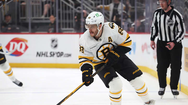 Mar 8, 2026; Pittsburgh, Pennsylvania, USA;  Boston Bruins right wing David Pastrnak (88) skates with the puck against the Pittsburgh Penguins during the third period at PPG Paints Arena. Mandatory Credit: Charles LeClaire-Imagn Images