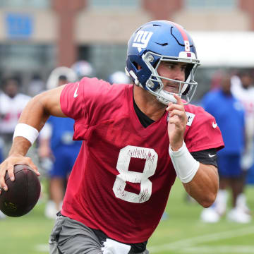 Jul 25, 2024; East Rutherford, NY, USA; New York Giants quarterback Daniel Jones (8) scrambles during training camp at Quest Diagnostics Training Center. Mandatory Credit: Lucas Boland-USA TODAY Sports