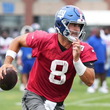 Jul 25, 2024; East Rutherford, NY, USA; New York Giants quarterback Daniel Jones (8) scrambles during training camp at Quest Diagnostics Training Center.  