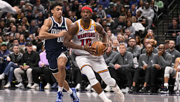 Feb 12, 2025; Dallas, Texas, USA; Dallas Mavericks guard Max Christie (00) and Golden State Warriors forward Jimmy Butler (10) in action during the game between the Dallas Mavericks and the Golden State Warriors at the American Airlines Center. Mandatory Credit: Jerome Miron-Imagn Images
