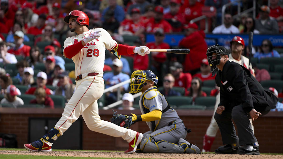 Apr 26, 2025; St. Louis, Missouri, USA;  St. Louis Cardinals third baseman Nolan Arenado (28) hits a solo walk-off home run against the Milwaukee Brewers during the ninth inning at Busch Stadium.