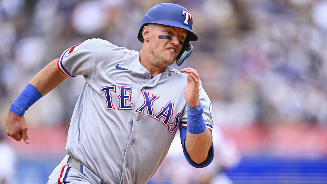 April 12, 2026; Los Angeles, California, USA; Texas Rangers third baseman Josh Jung (6) runs to home plate to score a run against the Los Angeles Dodgers during the eighth inning at Dodger Stadium. Mandatory Credit: Jonathan Hui-Imagn Images