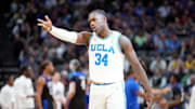 Mar 16, 2023; Sacramento, CA, USA; UCLA Bruins guard David Singleton (34) celebrates in the first half against the UNC Asheville Bulldogs at Golden 1 Center. Mandatory Credit: Kyle Terada-Imagn Images