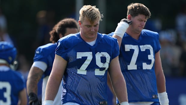 Bernhard Raimann (79) walks onto the field during the first day of the Indianapolis Colts’ training camp Thursday