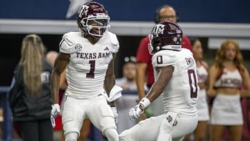 Sep 30, 2023; Arlington, Texas, USA; Texas A&M Aggies wide receiver Evan Stewart (1) and wide receiver Ainias Smith (0) In action during the game between the Texas A&M Aggies and the Arkansas Razorbacks at AT&T Stadium. Mandatory Credit: Jerome Miron-USA TODAY Sports