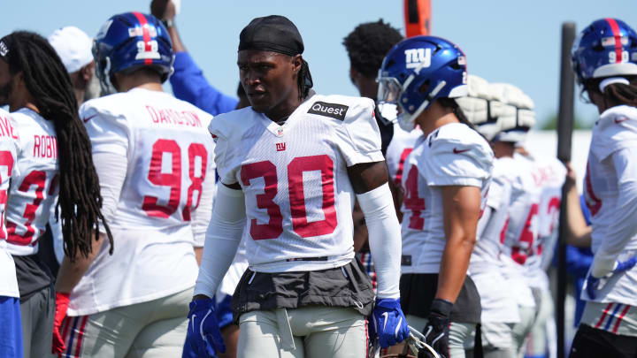 Jul 26, 2024; East Rutherford, NJ, USA; New York Giants cornerback Darnay Holmes (30) walks on the sideline during training camp at Quest Diagnostics Training Center. Mandatory Credit: Lucas Boland-USA TODAY Sports