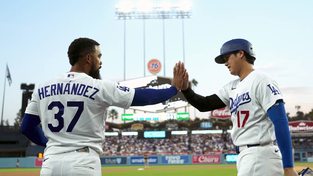 Aug 21, 2026; Los Angeles, California, USA; Los Angeles Dodgers designated hitter Shohei Ohtani (17) is congratulated by left fielder Teoscar Hernandez (37) after scoring on a two-run home run by third baseman Max Muncy (not pictured) in the first inning against the Pittsburgh Pirates at Dodger Stadium. Mandatory Credit: Kirby Lee-Imagn Images