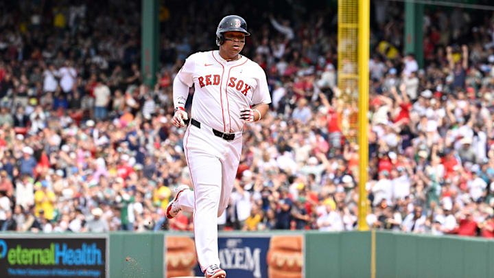 Boston Red Sox designated hitter Rafael Devers runs the bases after hitting a home run against the New York Yankees during the fifth inning at Fenway Park. Boston Red Sox designated hitter Rafael Devers runs the bases after hitting a home run against the New York Yankees during the fifth inning at Fenway Park.