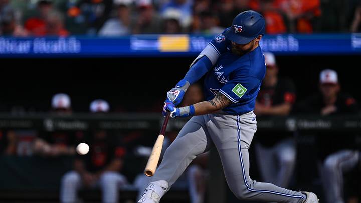 May 30, 2026; Baltimore, Maryland, USA;  Toronto Blue Jays outfielder Nathan Lukes (38) hits a lead off single in the eighth inning against the Baltimore Orioles at Oriole Park at Camden Yards. Mandatory Credit: Jamie Sabau-Imagn Images