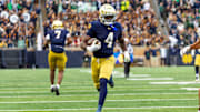 Nov 22, 2025; South Bend, Indiana, USA; Notre Dame Fighting Irish running back Jeremiyah Love (4) breaks loose for a touchdown run against the Syracuse Orange during the first half at Notre Dame Stadium. Mandatory Credit: Michael Caterina-Imagn Images
