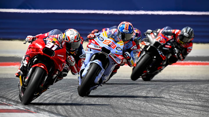 Apr 14, 2024; Austin, TX, USA; Pedro Acosta (31) of Spain and Red Bull Tech3 GASGAS and Marc Marquez (93) of Spain and Gresini Racing MotoGP and Maverick Vinales (12) of Spain and Aprilia Racing rides during the MotoGP Grand Prix of The Americas at Circuit of The Americas. Mandatory Credit: Jerome Miron-Imagn Images