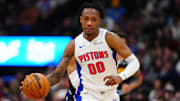 Dec 28, 2024; Denver, Colorado, USA; Detroit Pistons forward Ronald Holland II (00) dribbles up court in the second half against the Denver Nuggets at Ball Arena. Mandatory Credit: Ron Chenoy-Imagn Images