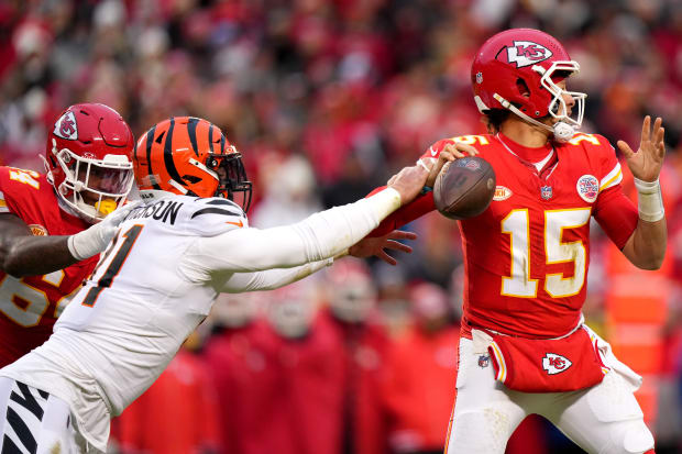 Cincinnati Bengals defensive end Trey Hendrickson (91) forces a fumble of Kansas City Chiefs quarterback Patrick Mahomes