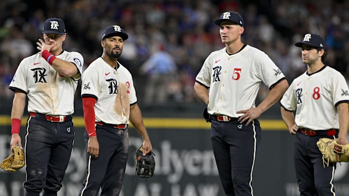 Texas Rangers third baseman Josh Jung (6) and second baseman Marcus Semien (2) and shortstop Corey Seager (5) and first baseman Josh Smith (8) during the game between the Texas Rangers and the Atlanta Braves at Globe Life Field.