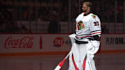 Apr 8, 2025; Pittsburgh, Pennsylvania, USA;  Chicago Blackhawks goaltender Spencer Knight (30) stands for the national anthem against the Pittsburgh Penguins at PPG Paints Arena. Mandatory Credit: Charles LeClaire-Imagn Images