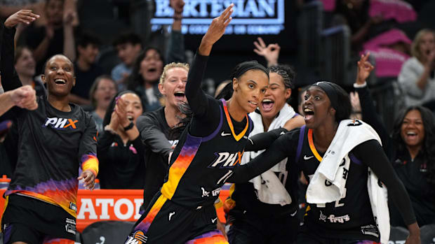 A photo of DeWanna Bonner celebrating a three