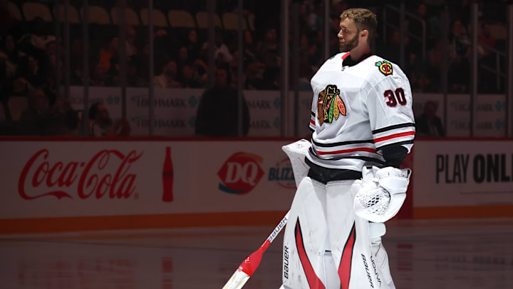 Apr 8, 2025; Pittsburgh, Pennsylvania, USA;  Chicago Blackhawks goaltender Spencer Knight (30) stands for the national anthem against the Pittsburgh Penguins at PPG Paints Arena. Mandatory Credit: Charles LeClaire-Imagn Images