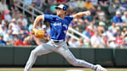 Mar 1, 2025; North Port, Florida, USA;  Toronto Blue Jays pitcher Josh Walker (21) throws a pitch during the fourth inning against the Atlanta Braves at CoolToday Park. Mandatory Credit: Kim Klement Neitzel-Imagn Images